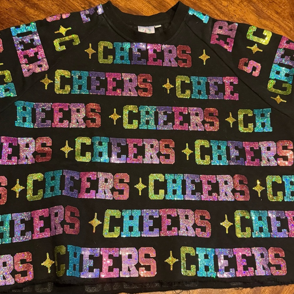 QUEEN OF SPARKLES Black Crop Top with Vibrant Cheers Design